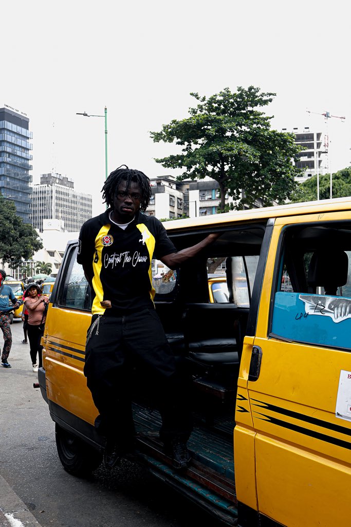 FataiE3's tweet photo. Lagos chaos, Control the chaos. 🖤💛

Quote this with your hardest caption.

Highest likes wins the polo. @emw3__ https://t.co/QpNxX9SpZ1