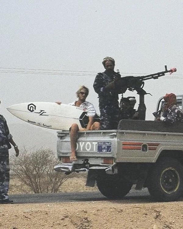 blackstarops's tweet photo. chas smith surfing in yemen in the early 2000s, shortly after the 9/11 attacks https://t.co/MEoYyYKVoC