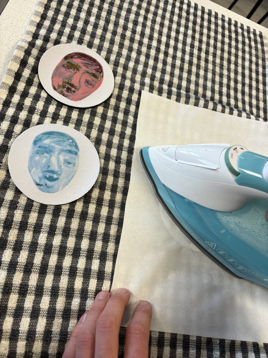 tase_art's tweet photo. Ironing transfer designs onto bags and coasters today as part of our mask project — practical creativity in action. Using photography skills to create merchandise #LifeSkills #ArtClass #CreativeLearning #DesignInAction #StudentWork #MakingSkills #HandsOnLearning https://t.co/q6ozYva8rQ