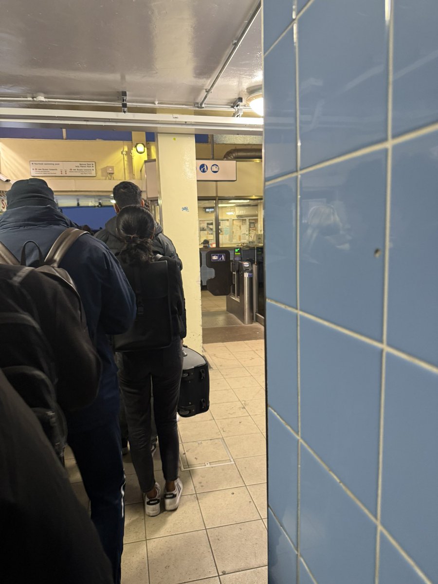 _Adefolake_'s tweet photo. Why are these losers queuing when there is a free barrier right here https://t.co/eKhYxRVzKt