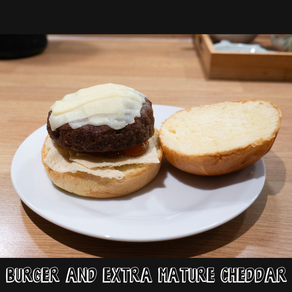 ColonelXB's tweet photo. Ladies and gentlemen, and children of all ages, I present the Poppadom Preach Burger. (I considered calling it the A Good Mango Is Hard To Find Burger).  Layers (bottom to top): Brioche bun bottom, poppadom, mango chutney, burger, extra mature cheddar, bacon, brioche bun top. https://t.co/kTp6HFjMuE