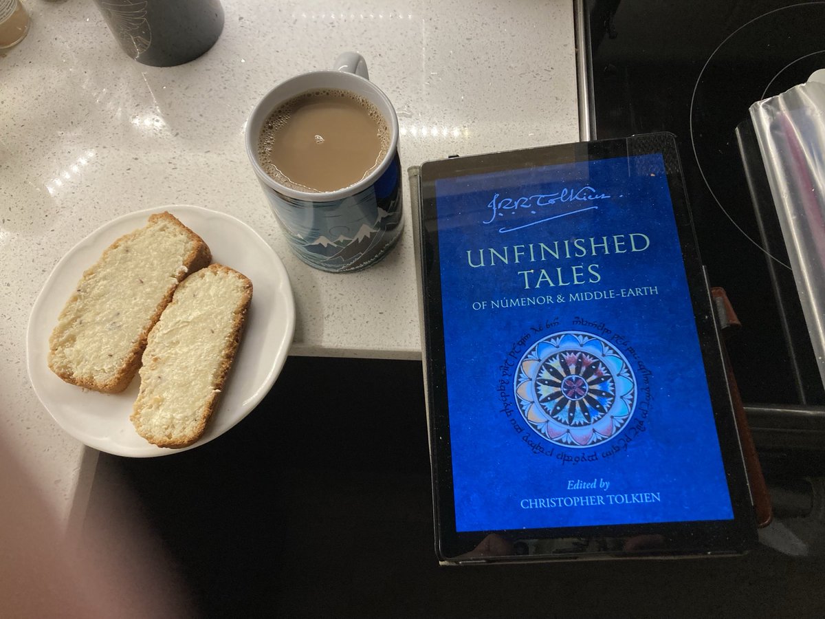 Celebrating Tolkien Reading Day with a mug of coffee, homemade seed cake and some 'Unfinished Tales'.