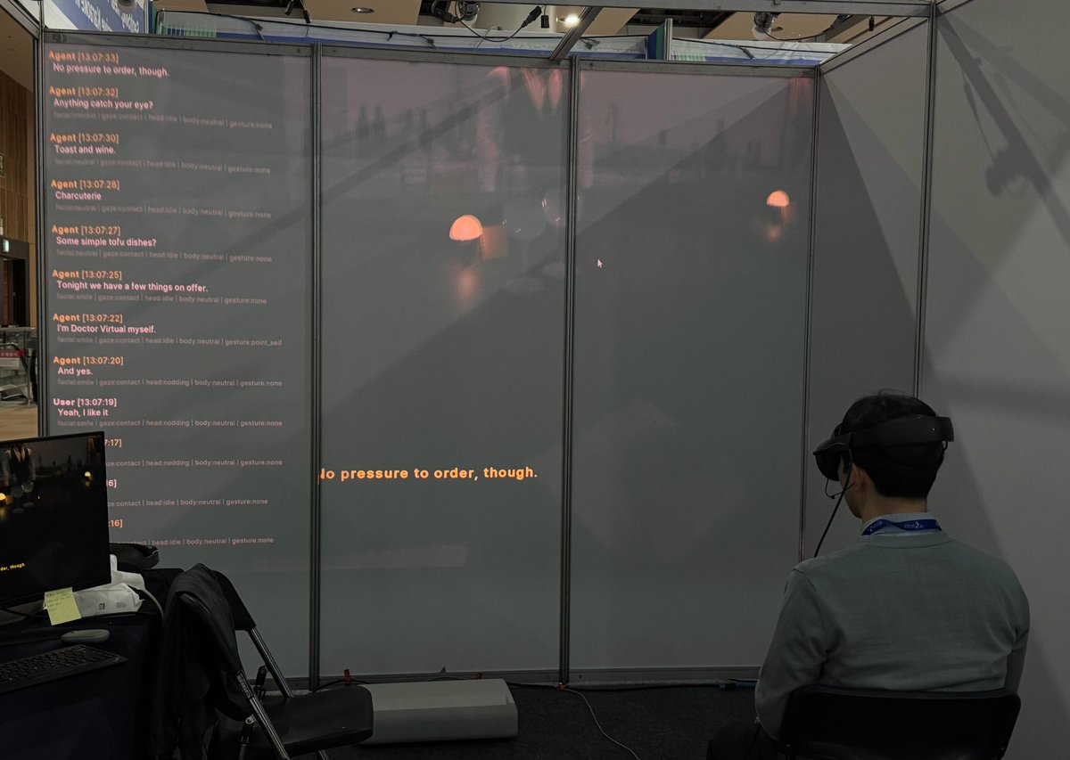 kimhynchl's tweet photo. Attendees noted low latency and high responsiveness, but also reported limitations in turn-taking and motion quality — all valuable feedback. We totally agree, and we are working toward more fluent social interaction with the agent. https://t.co/10MpOswwL2