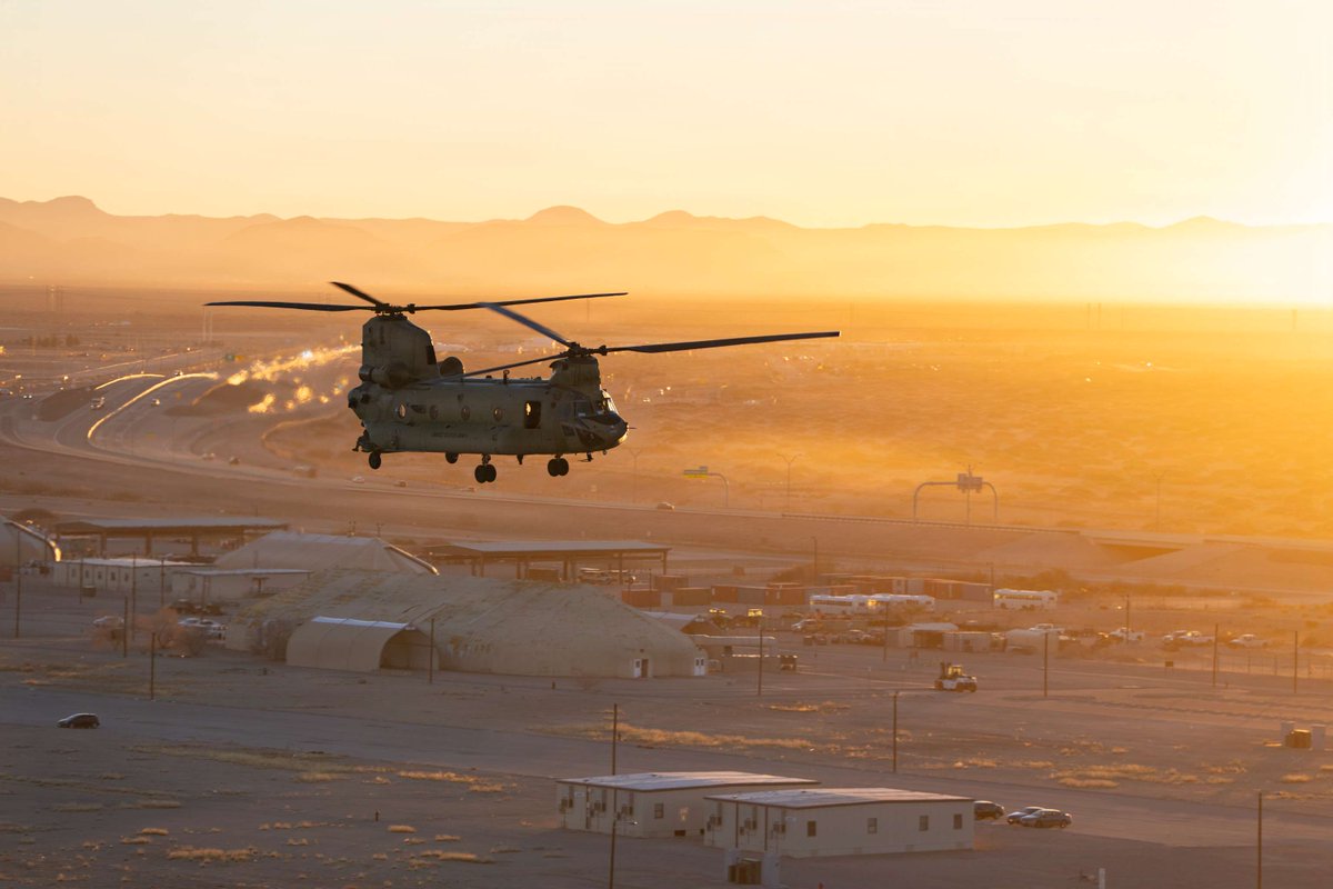 Army_Aviation's tweet photo. A CH-47 Chinook assigned to 2-501st AVN, 1st AD CAB, flies over a division run during the first day of Torch Week on March 2, 2026. The event honors the division’s role in Operation Torch and its history. Photo courtesy of DVIDS, Sgt. Charlie Duke. https://t.co/jsiWiK3mtN