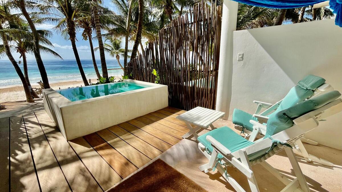 honeymoonscom's tweet photo. Escape to Cabanas Tulum's secluded beachfront oasis, where private terraces sway with hammocks and rooftop hot tubs melt away the world. Savor cocktails at Ziggy's Beach Club as waves kiss your toes. https://t.co/vXAk8amHss https://t.co/SrQPxUncEG