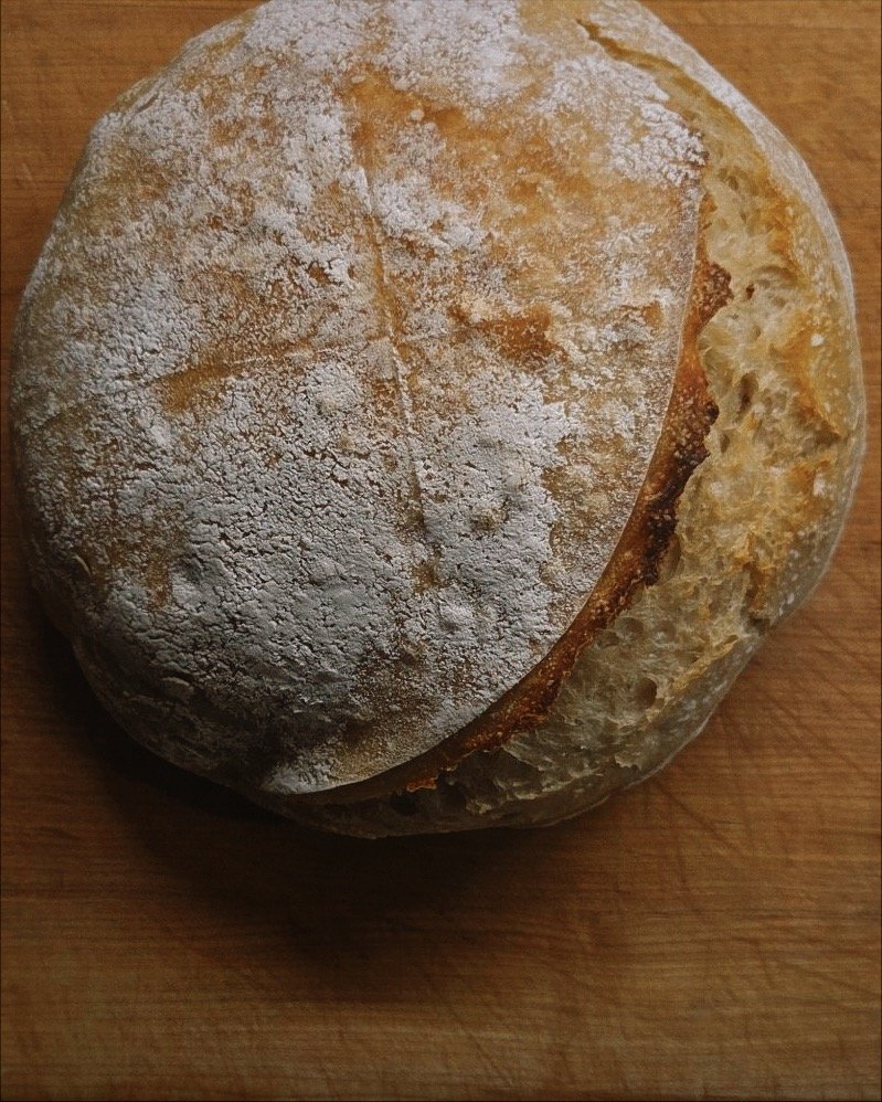 Father_LoCoco's tweet photo. Feeling very grateful for my parishioners!  After a long day of Lenten confessions (it was our annual diocesan event: "12 Hours of Reconciliation"), I returned to my rectory to find this picture perfect loaf of bread! https://t.co/OJDGwOBvUA