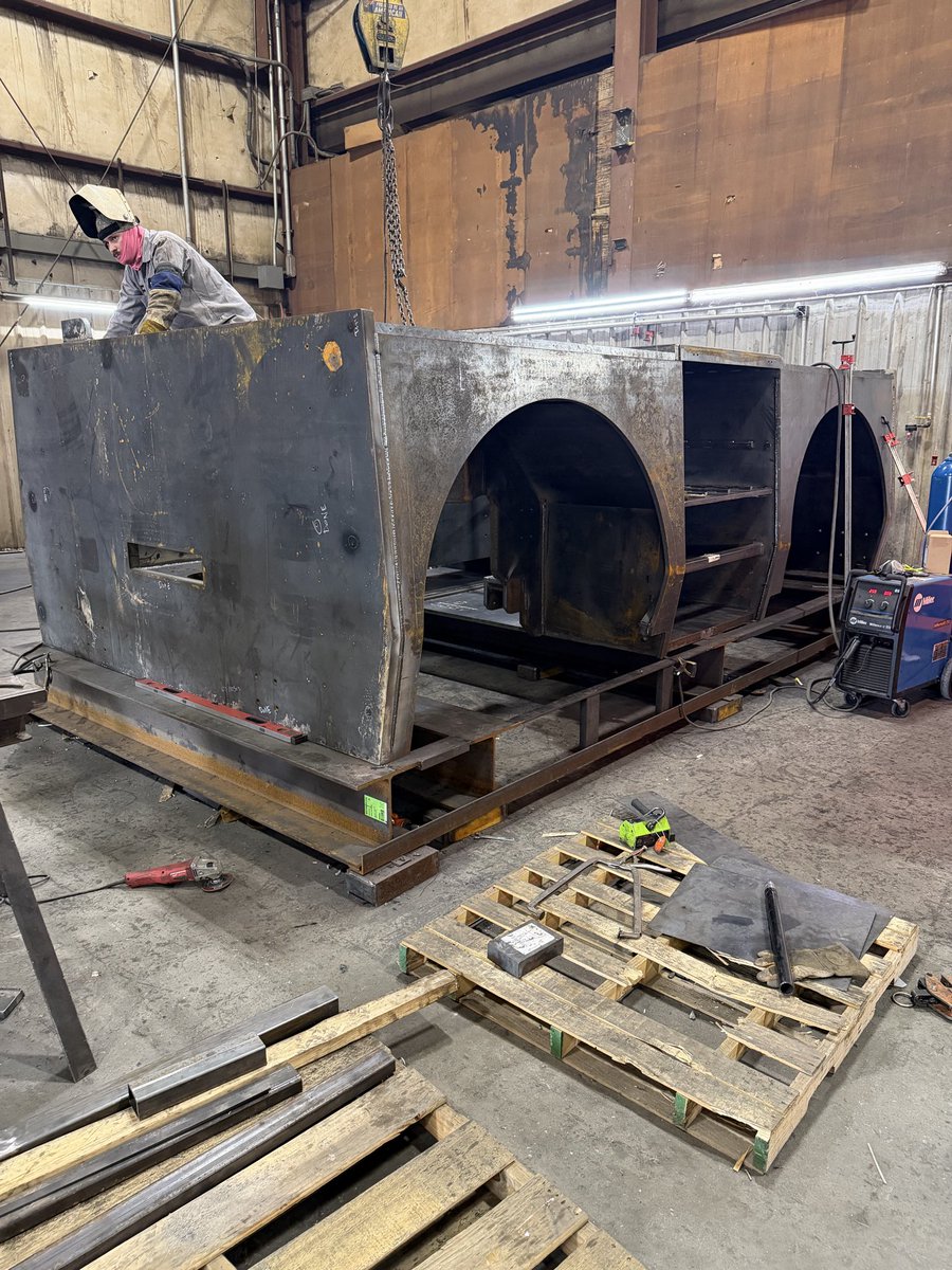 cresferrell's tweet photo. What are we manufacturing today @renewmfgsol… A gigantic tarmac ground service equipment tug that weigh 25T!  Helping to keep aircraft on time during this mess with @TSA our welder on top puts the size into perspective. https://t.co/ggtHDOgloZ