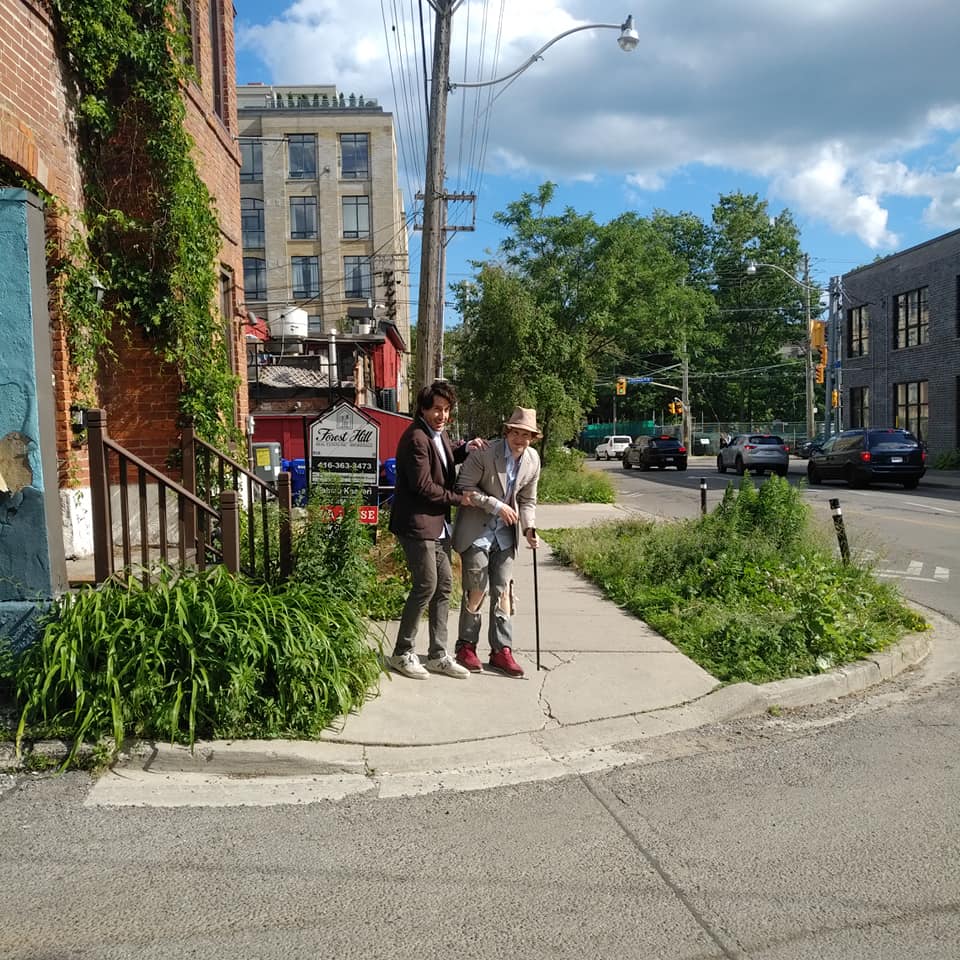 HEARTWARMING: Canadian pop star Jay McCarrol seen helping elderly man cross the street