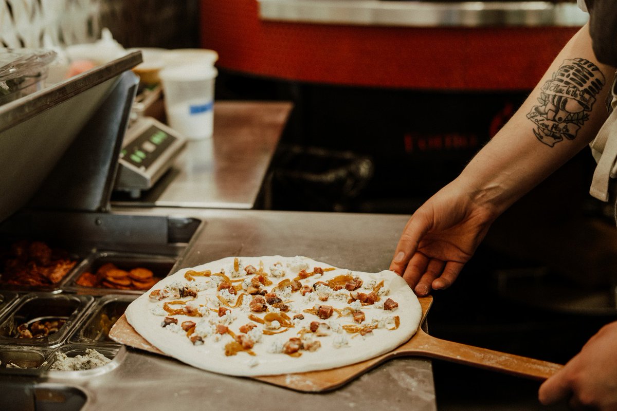 genisawinebar's tweet photo. Quality you can see, craft you can taste. We take our time with the dough so you can savor every bite. Hand-prepared and ready for the oven 🍕 https://t.co/KtD32riZef