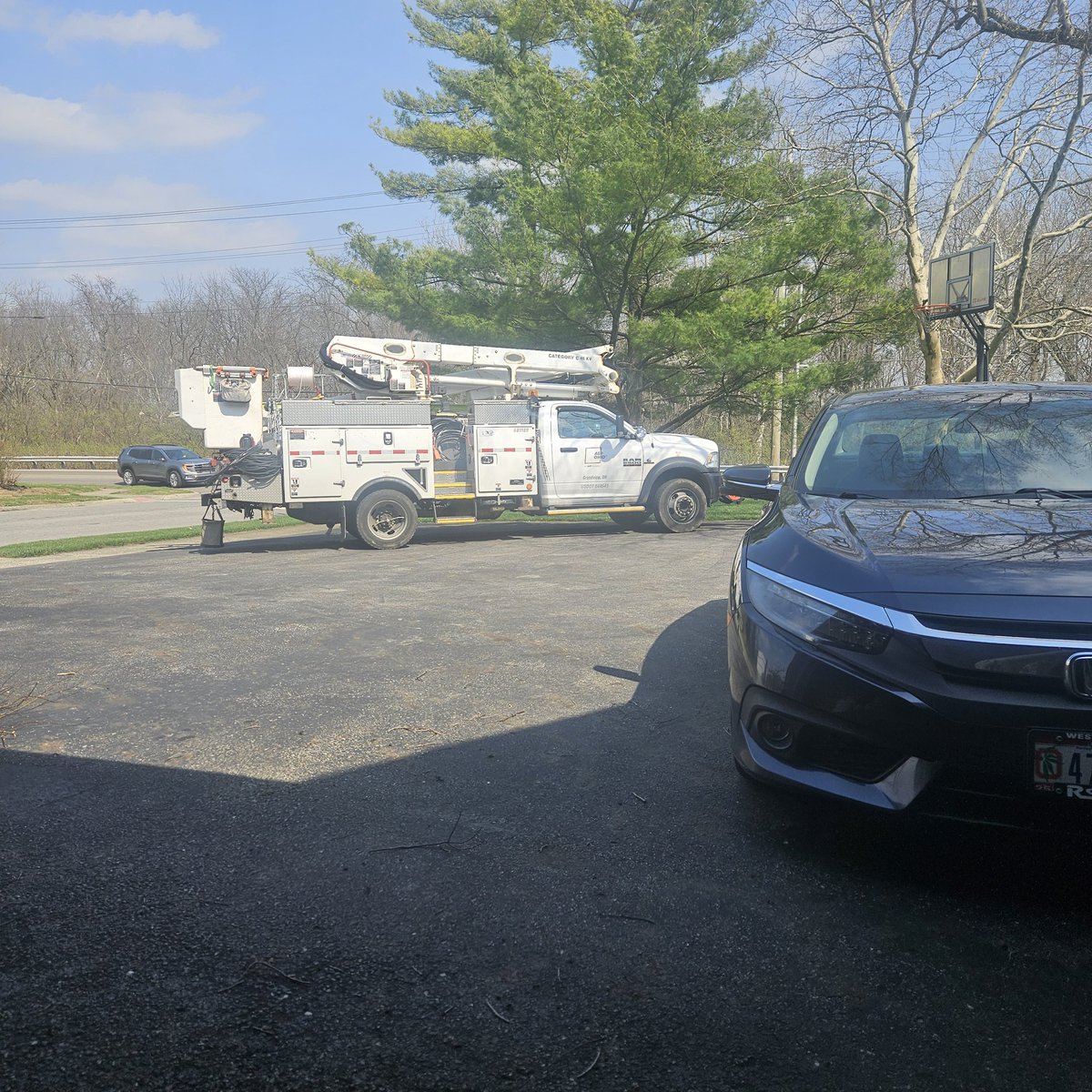 mcclain1970's tweet photo. What gives @aep the right to pull up into a residential driveway? https://t.co/peyeUypRmD