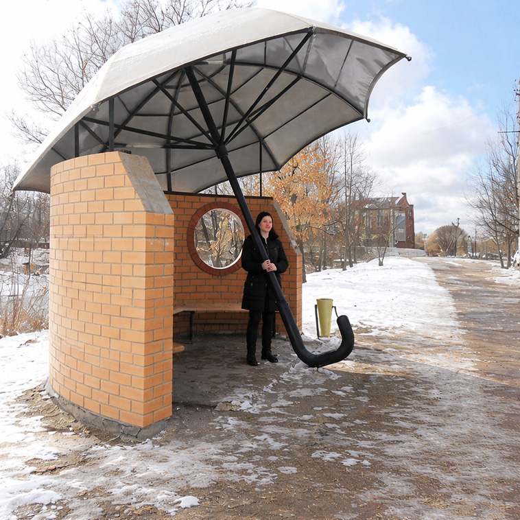 archpng's tweet image. Umbrella-shaped bus stop in Vyazma, Russia — a playful street design that transforms an ordinary shelter into an oversized umbrella.