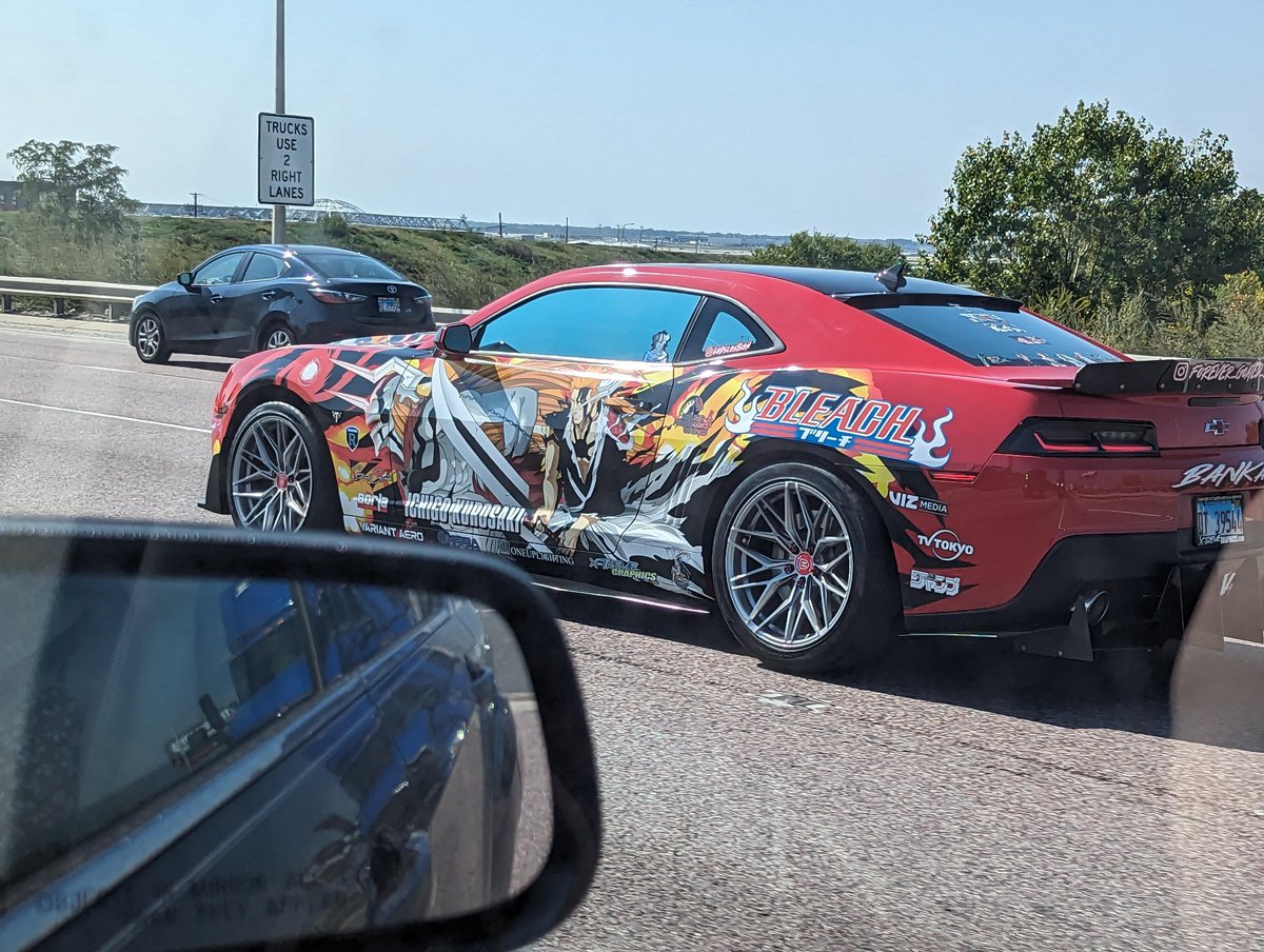 buriednumber1's tweet photo. You can't make this up I was on the highway and saw a Ichigo wrapped Camaro 😂 https://t.co/qT5IbpijTr