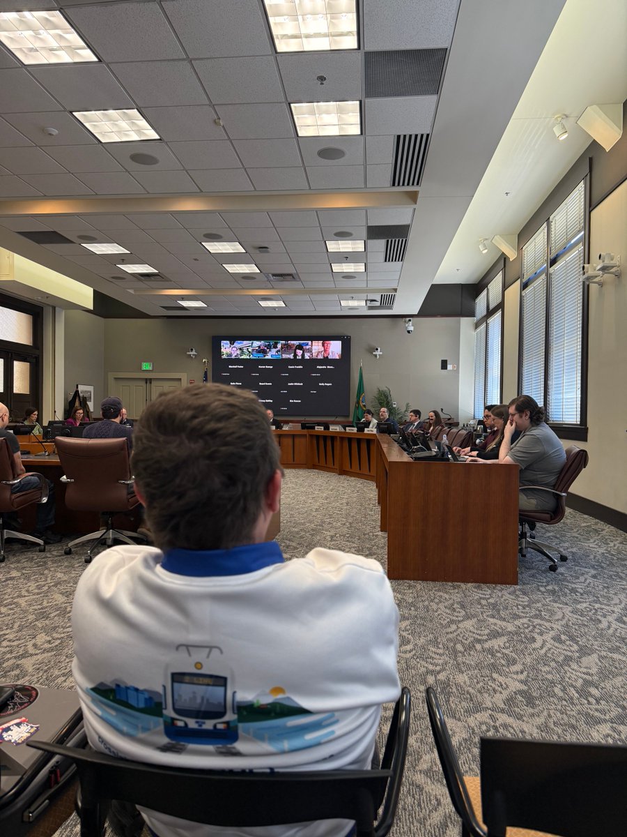 SheStickel's tweet photo. Sound Transit meeting today many may citizens are testifying to support trains to Ballard West Seattle Everett https://t.co/WRXkVFpEsS