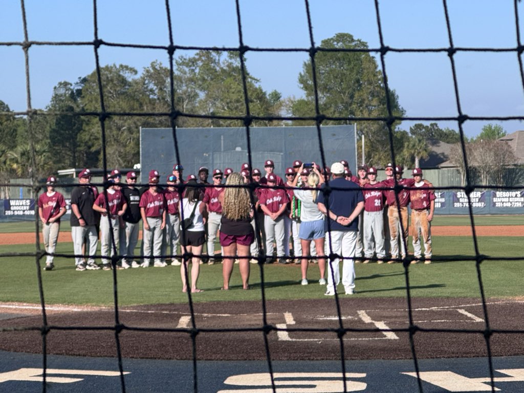 So after 14 innings the coaches and umpires get together and decide we have co-champions. The Game ends in a 6-6 tie.