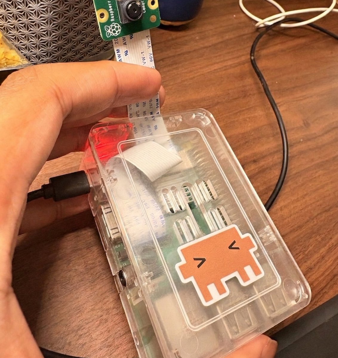 carverfomo's tweet photo. A Chinese engineering student built a Claude powered device the size of a credit card. Raspberry Pi. Camera. One red LED. Total cost $14.

His professor called it a toy. His classmates laughed. He posted a demo on YouTube and got 200 views.

Then someone noticed what the device was actually connected to.

A wallet. Making $11 million. In 10 months.

kch123. $11,525,240 profit. 2,347 predictions. Joined June 2025.

→ Profile: https://t.co/2KJu2NVLlY

The device does one thing. He asks it a question with his voice. Claude scans thousands of prediction markets in real time. When it finds a price that doesn't match reality the red LED lights up.

Red light. He places the trade. Green result.

$2M position on Seahawks. Won. $1.5M on Villarreal not winning.

His professor saw the YouTube video again three months later. The demo was the same. The view count wasn't. Neither was the wallet.

He asked the student what changed. The student showed him the balance. The professor didn't say anything. Sat down. Then asked if the device could run two accounts.

759K people watching. $319K still loaded in active positions. The device fits in your hand. The LED is still blinking.

His classmates stopped laughing around month four. By month six two of them had built their own.