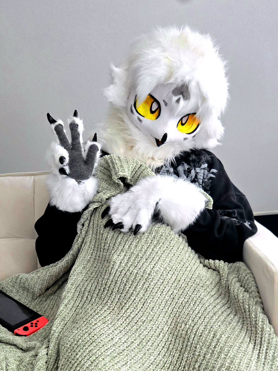 Finished sewing in his hair markings, and glossing up his talons