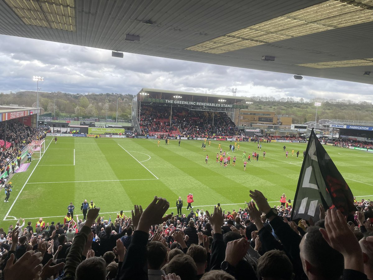 Lincoln City 1-0 AFC Wimbledon

Ryan Oné 😍
One more point for promotion! This was far from a thriller, but that’s what champions do! There were no favours elsewhere today, so it’s to Reading on Easter Monday we go! 
#AFCW | #WeAreImps | #Imps | #ImpsAsOne