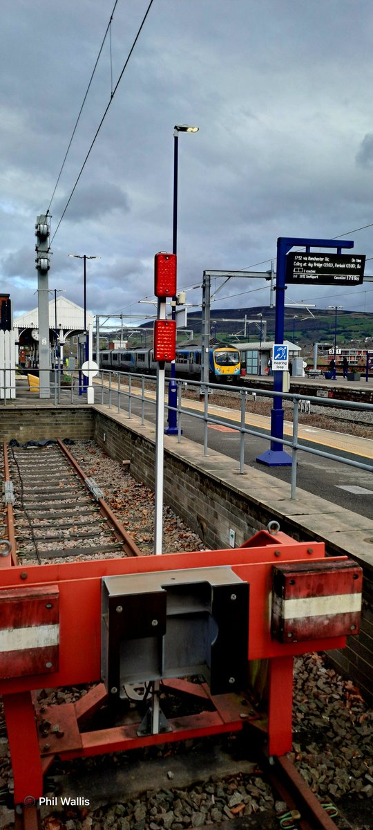Guard_Amos's tweet image. Hello friend. @TPExpressTrains #siemens185107 is seen from @northernassist #flex769450 as it makes its call with a service from Manchester Piccadilly to York via Wakefield. This also makes for today's view from the #mobileoffice