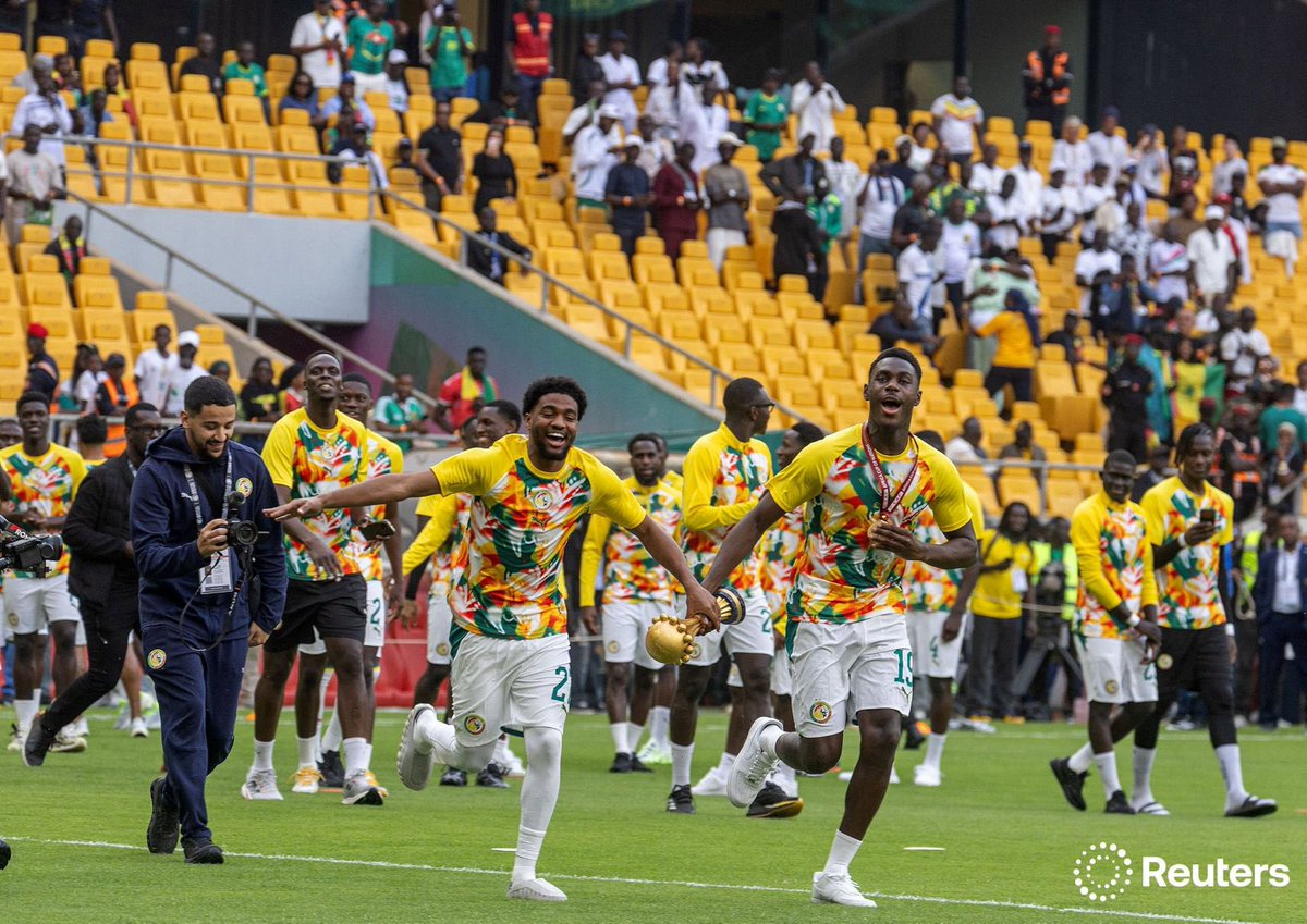 LikkaShot's tweet photo. Senegal  continue there celebration of the Afcon trophy and fighting justice for their 18 supporters #reuters #senegal #afcon2025 https://t.co/Co9Yqt5XMG