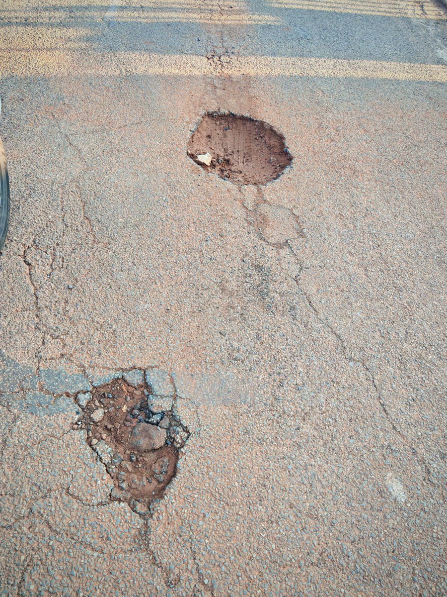 KarishmaT's tweet photo. @MyJRA Many potholes on Olifants Street In Extension 2 Lenasia. The one by the stop signs are the worst. Kindly assist. @CityofJoburgZA https://t.co/2bgMX6s7cT