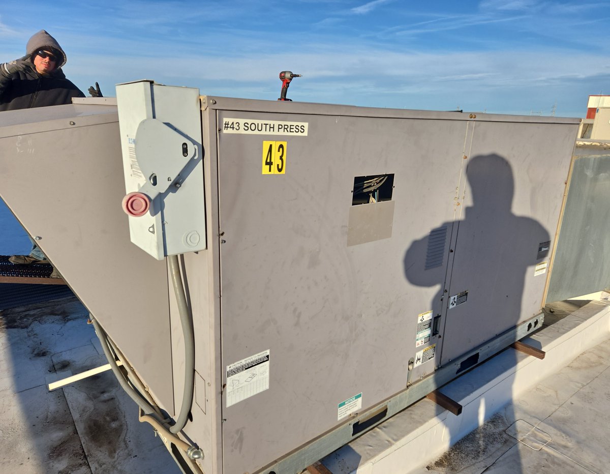 Finishing out the week straightening some condenser coil fins on this RTU!