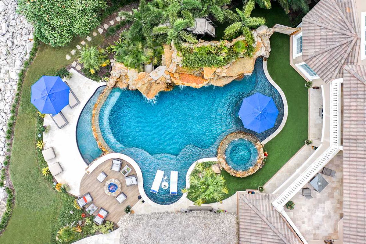 lucaslagoons's tweet image. We not only created an amazing pool, but we also created the ultimate outdoor living space with so many features: a tiki Hut, a hidden water slide, spa, massive grotto, sun shelf, infinity edge, firepit, and the list goes on. #insanepools #lucaslagoons #pool