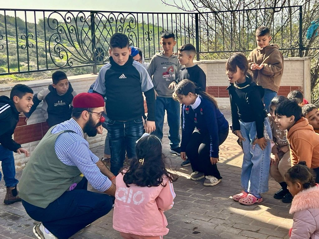 RednosesPS's tweet photo. 🔴 RED NOSES Palestine Spreads Joy Among Displaced Children from Jenin Camp.

🌟 RNPS has been conducting regular visits since February 2026 through its healthcare clowns at displacement centers across the city of Jenin. https://t.co/fFvGRrQJjr