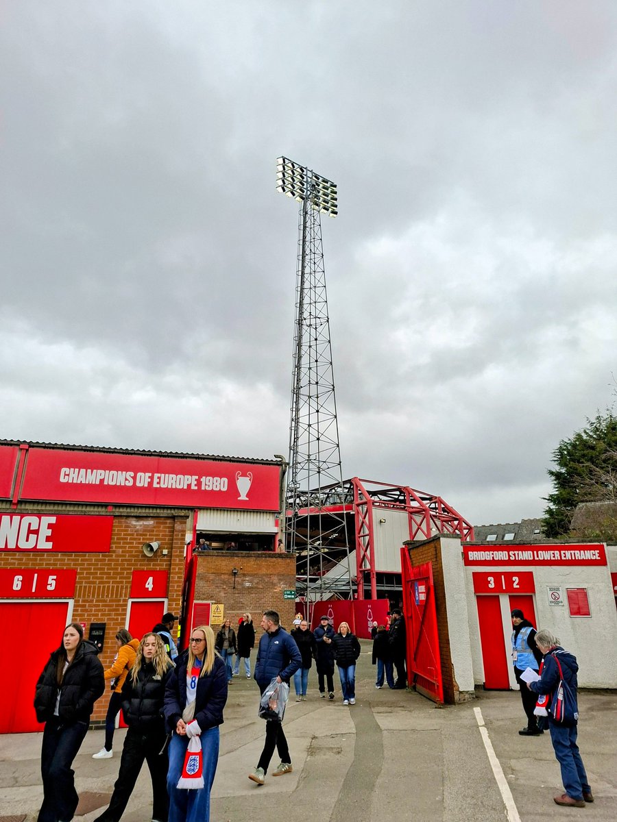 Scott10354188's tweet photo. Today's #FloodlightFriday comes from the iconic City Ground in Nottingham, home of @NFFC. Here is a view from one of the entrances to the Peter Taylor Stand. https://t.co/unt7Aq4Er8