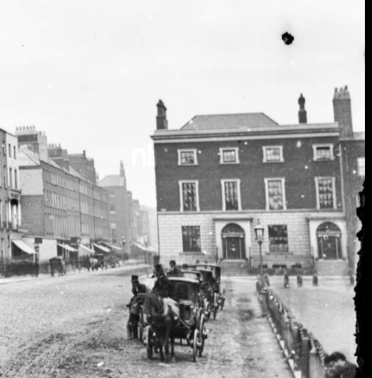 Photo of the interior including rococo stucco ceiling of the Apollo room of Tracton House on the corner of Merrion Row and St Stephens Green. Building was completed around 1744 and demolished for the current Bank of Ireland building around 1912.