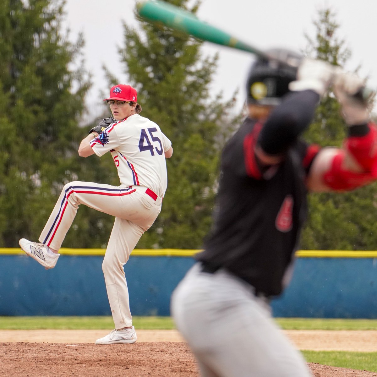 BillGaither's tweet photo. Little baseball in the rain action from yesterday's game against Southeastern. 🌧⚾️ #ChargeUp

More 📸 on Flickr➡️ https://t.co/f25WkUAN24 https://t.co/LexBfeeP79