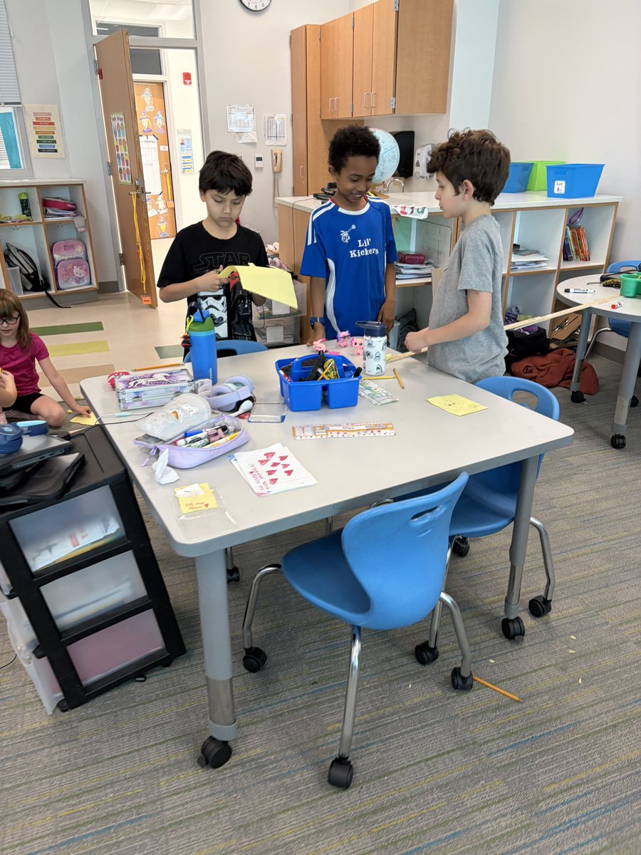 We spent our track out day collaborating on a measurement challenge: create a paper chain two yards long with only one piece of paper!
