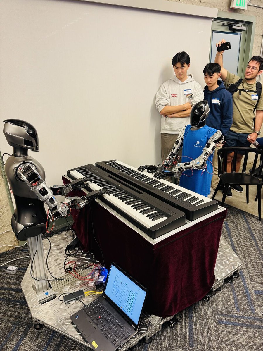 junfanzhu98's tweet photo. Next-Gen Robotic Models & Embodiment: The Dexterity Frontier by DeepReach & Realhand in Palo Alto
Formal Interface Between Evaluation and Generation in Robot Foundation Models — #Robometer × #DreamZero Toward Trajectory-Space Intelligence

The bottleneck in robot foundation models is not planning or data scale, but the lack of a stable interface between evaluation (System 2) and action generation (System 1) under real-world dynamics.
Robometer strengthens explicit evaluation through video-language reward modeling (progress estimation + trajectory preference), but remains outside the policy computation graph. This creates a fundamental optimization interface mismatch with three key challenges:
🔷 Gradient-based optimization is ill-posed: reward models are not directly coupled within the policy’s computation graph, making signal propagation into continuous action spaces inefficient and unstable.
🔷 Co-training is unstable: joint optimization leads to non-stationarity, reward hacking, and severe distribution shift.
🔷 Temporal abstraction mismatch: rewards operate at trajectory-level semantics, while actions occur at high-frequency continuous control, making long-horizon credit assignment fundamentally difficult — far more complex than discrete next-token prediction in LLMs.

DreamZero collapses policy and world model via generative rollout (implicit evaluation through joint video + action prediction), enabling strong zero-shot and cross-embodiment generalization. Yet, despite supporting real-time closed-loop control at 7Hz via autoregressive updates with observation correction, it remains susceptible to residual drift over long horizons and lacks explicit preference grounding.

Crucially, current world-action models remain coarse in temporal and control granularity, limiting precision in fine manipulation.
The primary failure mode is not high-level planning, but decoding abstract intent into physically valid, high-frequency control under contact-rich dynamics (friction, deformation, slip) and partial observability.

This is further constrained by a control frequency gap (∼10–30Hz perception/generation vs. ∼100–1000Hz control) and by latent action representations that are not fully physically grounded.
Data is not merely low-resolution — it is fundamentally misaligned with control (vision vs. force/torque/impedance). For example, grasping involves sub-frame contact events that standard video cannot capture.

The emerging paradigm is reward-guided generative control: world models propose diverse trajectories, while reward models shape them at the trajectory level via re-ranking or guidance (e.g., MPC-style selection or diffusion guidance), avoiding brittle gradient coupling and unstable co-training.
Robotics is not converging to next-token prediction, but to trajectory-space intelligence: generation proposes, evaluation shapes, and control executes — all grounded in closed-loop interaction with real physical dynamics.