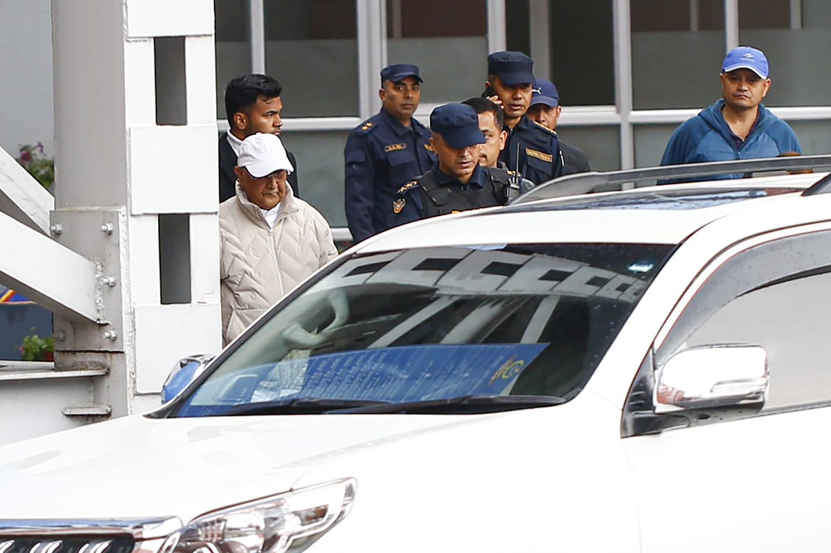 Former Prime Minister KP Sharma Oli is taken to a hospital from police custody after being arrested from his residence in Gundu in connection with an ongoing political and legal case linked to the killings during the September Gen Z protests, in Kathmandu, Nepal, on Saturday.