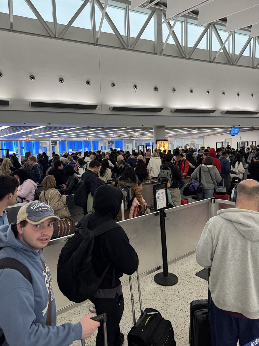 annalimeng's tweet photo. JFK terminal 5 JetBlue line is really long. No clear. TSA pretty much doesn’t work. Budget at least 2 hours in line, if not more. Worst case, ask to cut the line. Thank you to all the angels that let us go through. Fingers crossed we make the flight 🙏🏻 https://t.co/EVfH6d4ACj