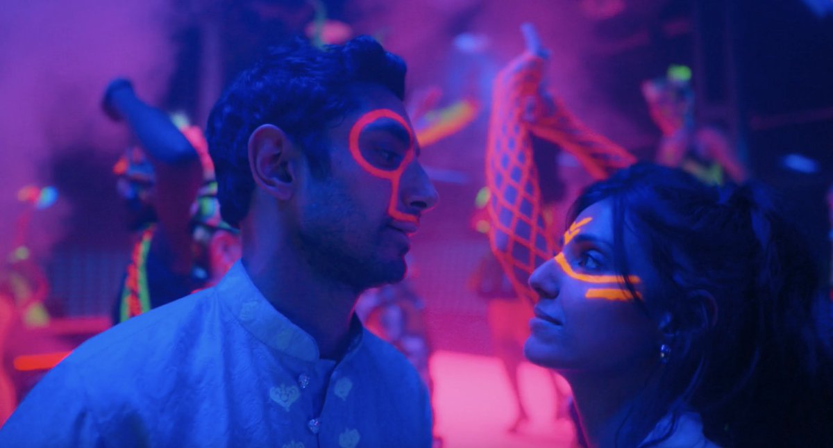 Iawolfes's tweet photo. riz ahmed and ritu arya's chemistry in episode 4 of #Bait i'm obsessed...need them to do a rom-com immediately https://t.co/CwOL48Tiqa