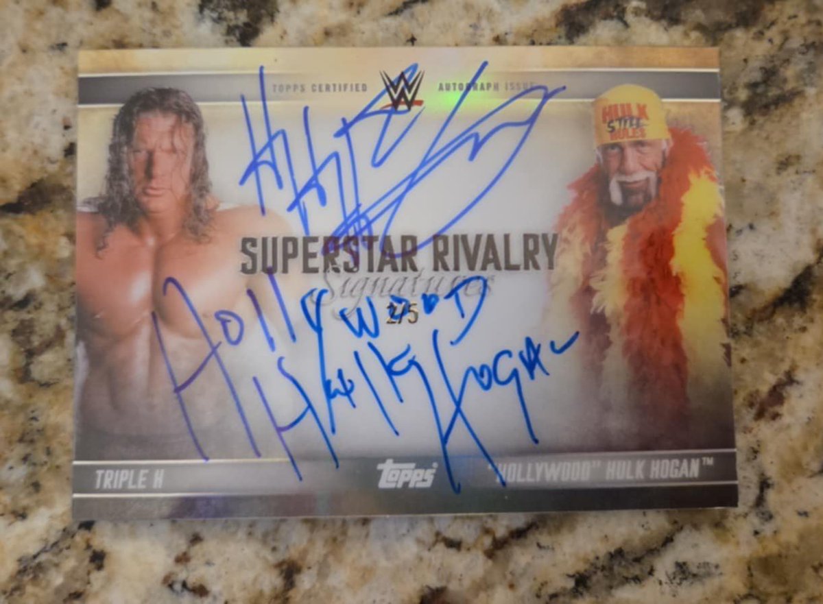 Intoxicator's tweet photo. Finally found some @Topps @wwe universe cards at Target and decided to rip with the kiddos. AND OMFG!! LOOK AT WE PULLED!! Theyre so happy!! @TripleH https://t.co/gkN3trDqlZ
