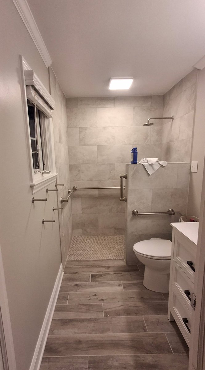 CollinJHumphrey's tweet photo. 7 days is up y’all and we successfully remodeled this bathroom. What do you think??

This one was for a handicapped woman who lives with her parents. She went out of town for 7 days… like every contractor, of course I said we’d get it done in 7 days or less. 

If you know anything about waterproofing, tile, prep, paint, crown, sub floor repairs, framing, grab bars, dry times, etc.. you know that’s a lot of work in a short window.

Proud of the team. Heck I even jumped in and hung crown and a couple grab bars myself, which are sturdy, let me tell ya. lol

Now I know it can be done.
And more importantly… she came home to a safer bathroom that was finished just for her. 

That’s what it’s all about folks. 💪