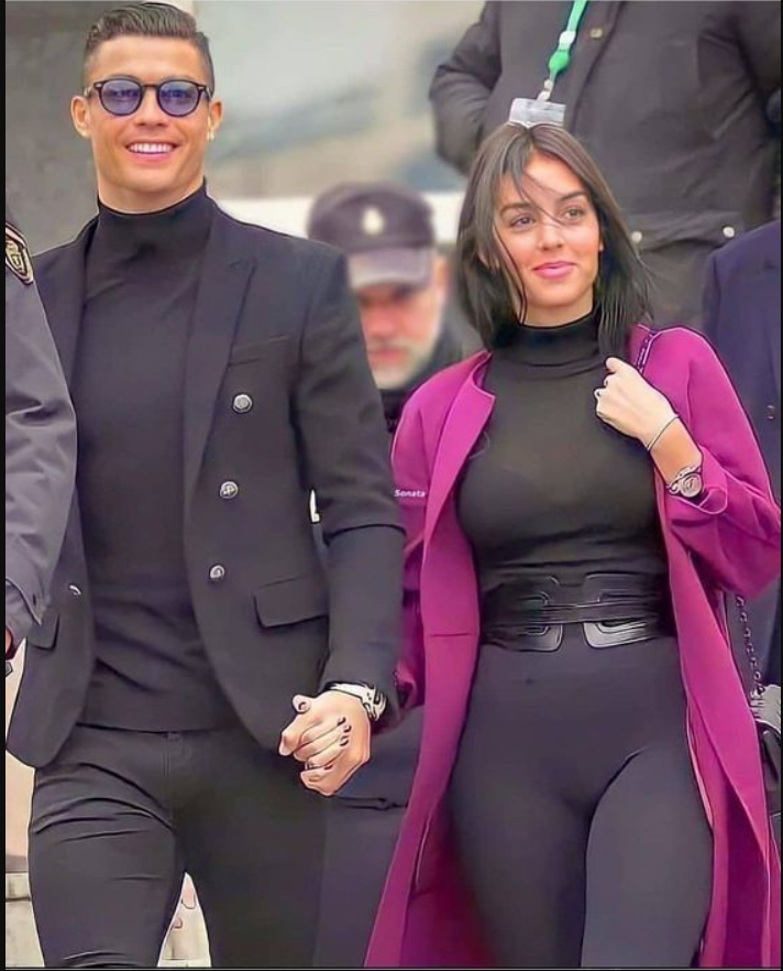 Visca_Barca_05's tweet photo. 😎 Heyyy @grok, swap their outfits! 🔄👗🕴️  

Imagine Cristiano rocking the purple coat and Georgina in the sleek black suit — style goals unlocked! 😍🔥 https://t.co/dz1YgicyyR