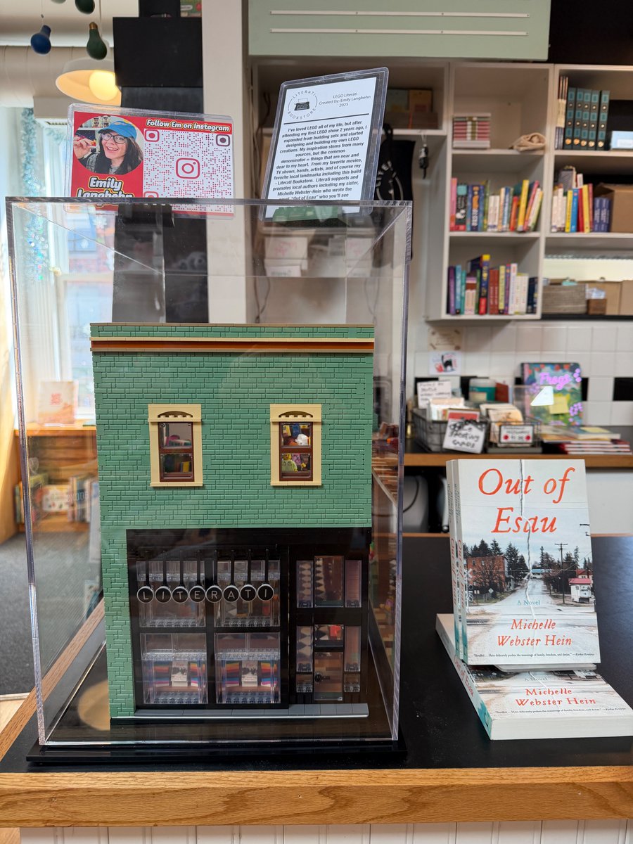 LiteratiBkstore's tweet photo. Literati goes LEGO! Thank you Emily Langbehn for constructing this -- a feat that took three months! This is now on display on our upper level in the bookstore. Be sure to check out the books on display (including Langbehn's sister's novel, Out of Esau by Michelle Webster Hein). https://t.co/CqrzbcOUmH