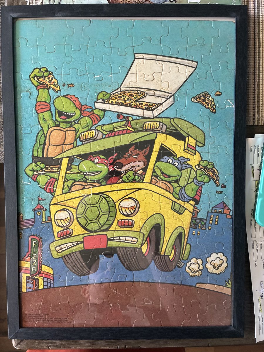 HCE1985's tweet photo. After many years I finally put my Teenage Mutant Ninja Turtles puzzle, I did as a kid in a frame. https://t.co/k2ZXimDp7U