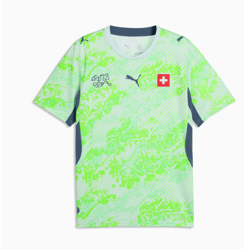 CDM2026_'s tweet photo. Nouveau maillot extérieur de la Nati : le vert et le gris pour la Coupe du monde 2026 https://t.co/FggBGyxyzV https://t.co/vG6kUAfDsf