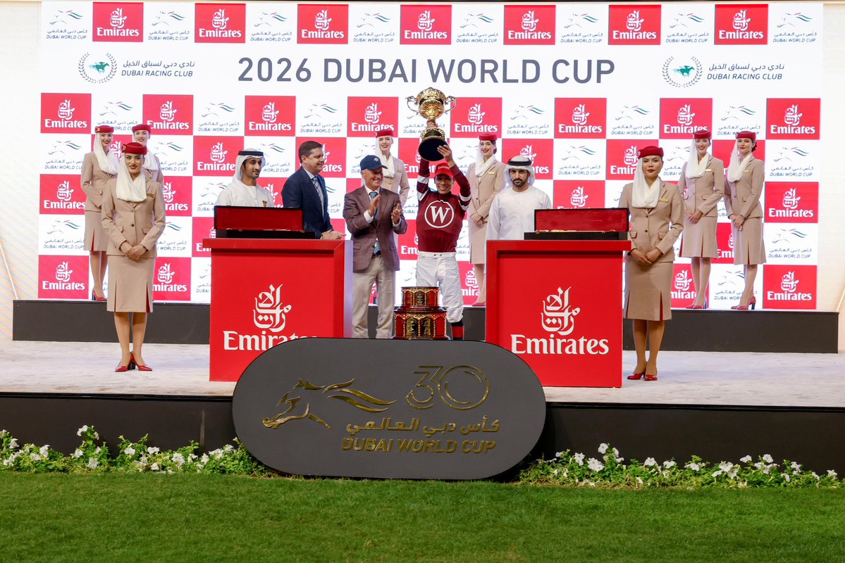 DXBMediaOffice's tweet image. Hamdan bin Mohammed presents the Dubai World Cup trophy to the winner of the main Group 1 race, Magnitude, ridden by jockey Jose Ortiz.
