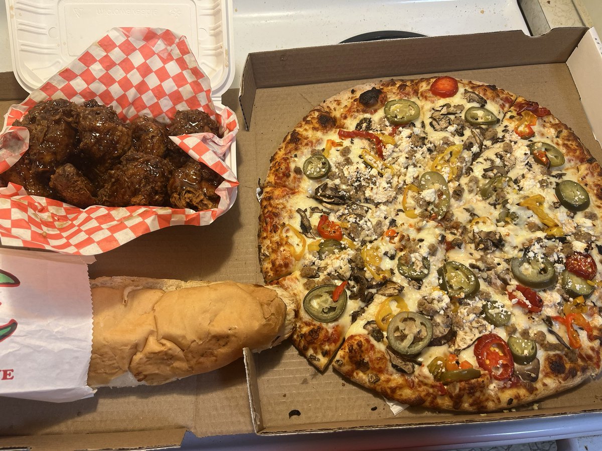 After a long exhausting week I decided to treat myself to pizza &amp; wings for dinner. Pro tip, dip the garlic bread in wing sauce at bottom of container. Chefs kiss.
