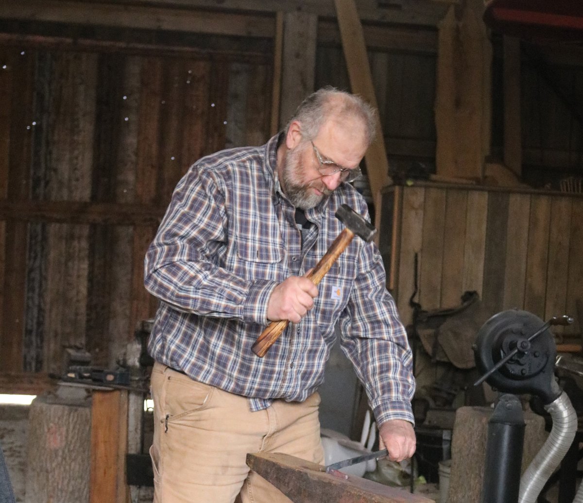ExpressNewsHome's tweet photo. The Richfield Historical Society hosted its annual Maple Syrup Day at. Richfield Historical Park on March 28.  Jonathan Walton (pictured below) makes a hook for a wall at the blacksmith shop during the event. Photo by Thomas J. McKillen. https://t.co/XBTzuVLniS