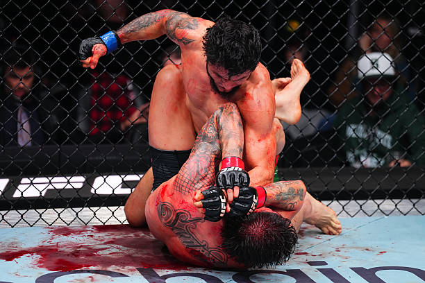 UFConPolymarket's tweet image. Blatant fence grabs and headbutts from Tofiq Musayev, nevertheless a crazy fight. #UFCSeattle