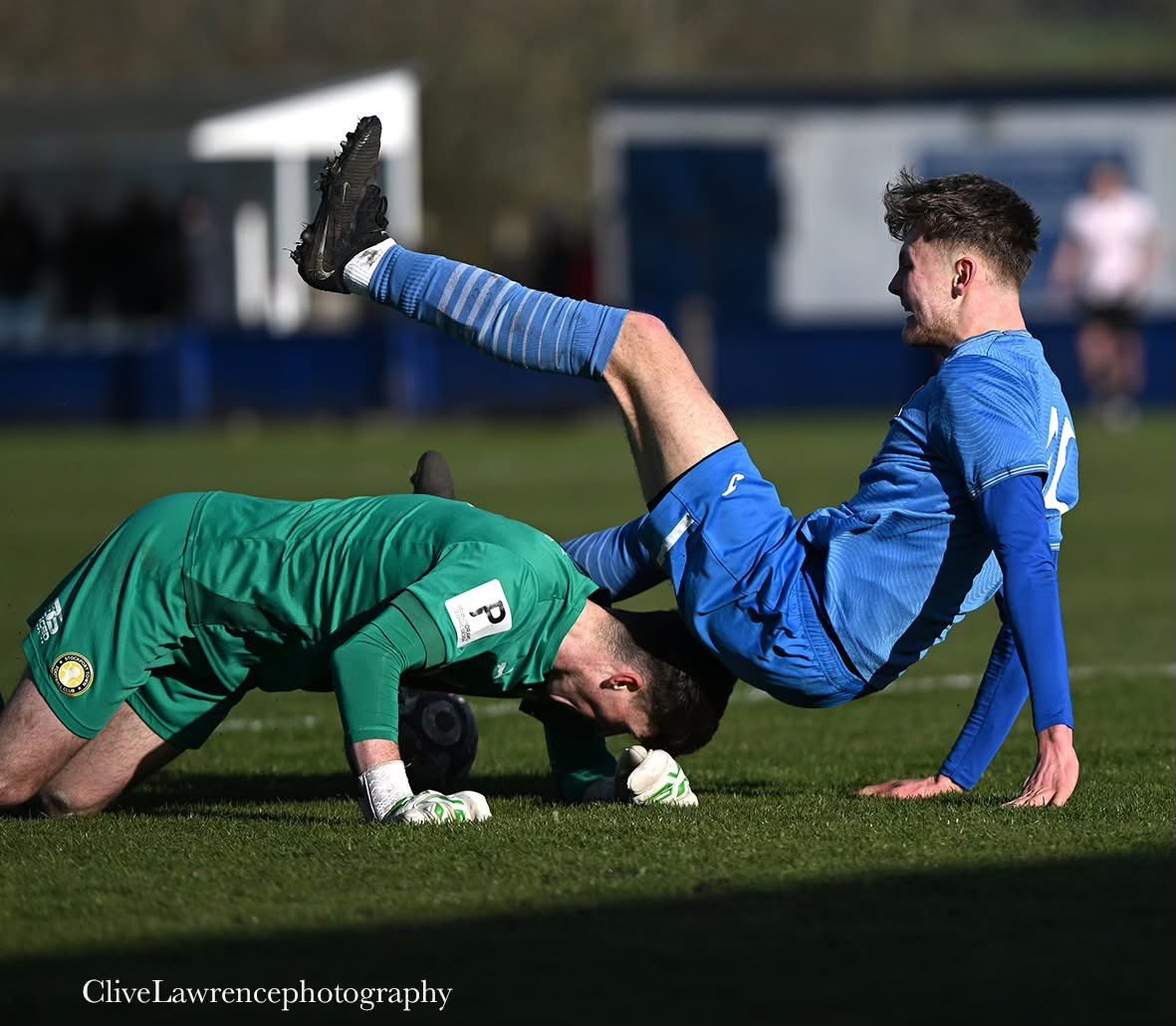 Machell PAYING THE PENALTY....Freddie Machell slides the ball past the oncoming ...