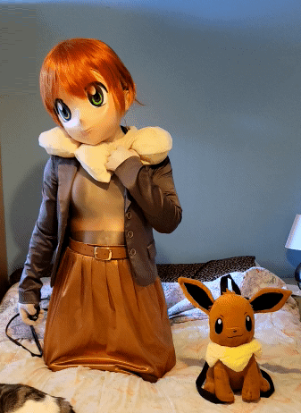 CanadianBanana's tweet photo. I woke up in my Shiney Eevee dress!  It's for Parties!  Don't I look great?  I am going to show it off at dinner!  Eevee!  Eevee!

#animegao #kigurumimask https://t.co/N7iyNaNzQp