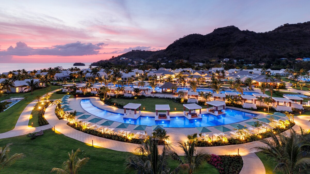 honeymoonscom's tweet photo. Escape to Sandals Saint Vincent, the adults-only, all-inclusive paradise nestled in a secluded cove with lush forests and overwater bungalows. Savor shared seasonal platters at Buccan, Sandals' first communal restaurant with an open kitchen. https://t.co/g26gWRcIsL https://t.co/DZFUCCK325