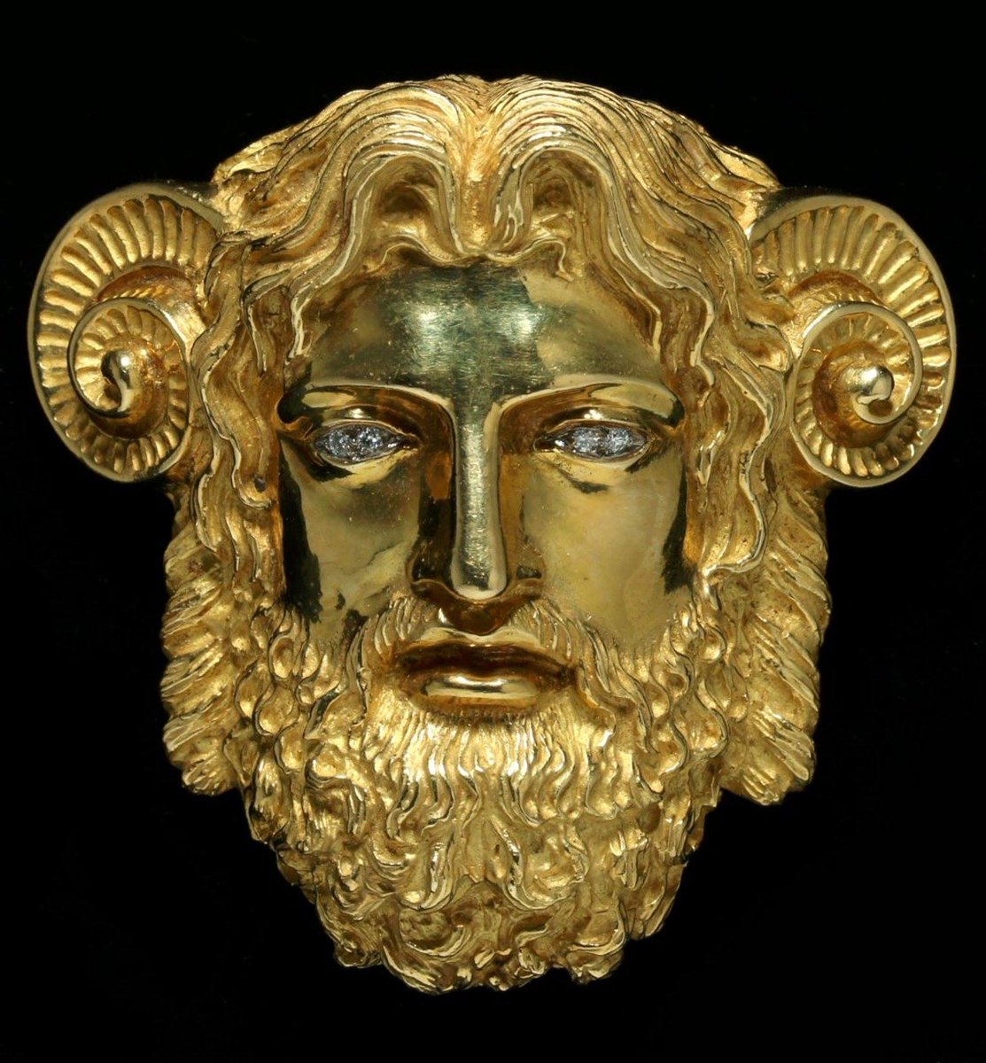 egyptomuseum's tweet photo. Zeus–Ammon (Syncretic deity of Greek and Egyptian tradition)

▫️Zeus–Ammon represents the fusion of the Ancient Egyptian god Amun with the #Greek god Zeus, arising through Greek contact with #Egypt and #Libya during the Late Period (from c. 5th century B.C. onward).

Through interpretatio graeca, Amun (who rose to prominence as a supreme creator and chief deity of Egypt during the Middle and New Kingdoms) was identified with Zeus, sharing attributes of divine authority, kingship, and oracular power.

The association gained wider prominence following the visit of #AlexandertheGreat to the oracle of Amun at Siwa Oasis in 332 B.C., where he was said to have been acknowledged as the son of the god. Thereafter, Zeus–Ammon was frequently depicted with ram’s horns, symbolising Amun’s sacred animal and reinforcing the combined identity.

Rather than a newly created deity, Zeus–Ammon reflects a theological convergence, understood as Amun by Egyptians and as Zeus in Egyptian guise by the Greek world.

✨Image:

Head of Zeus–Ammon (modern jewellery piece)

18k gold, set with diamonds. Signed “Wander France”

Dimensions: 2.5 × 2.5 in (c. 6.3 × 6.3 cm). Weight: 87 g