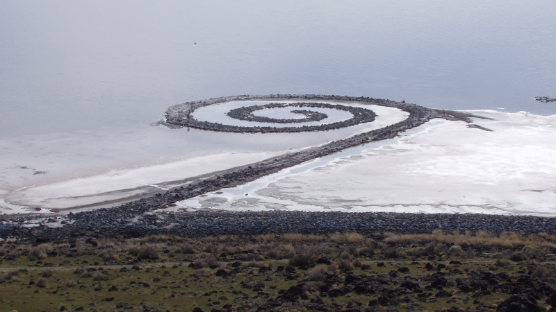 Whereisarts's tweet photo. A monument built from the earth itself. 🧱 Robert Smithson’s "Spiral Jetty" (1970) is the defining masterpiece of Land Art. A massive, 1,500-foot coil constructed from 6,000 tons of black basalt rock and earth, reaching into the Great Salt Lake, Utah. 🇺🇸 #RobertSmithson https://t.co/gpLXeSKtGk